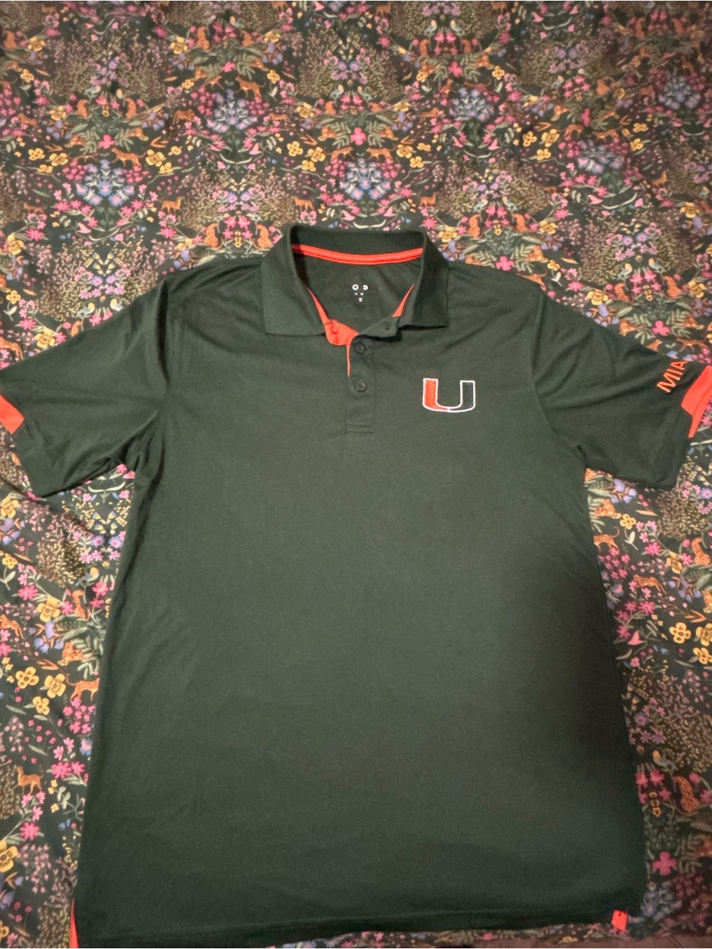 Colosseum Green Polo with Orange Trim and Embroidered U